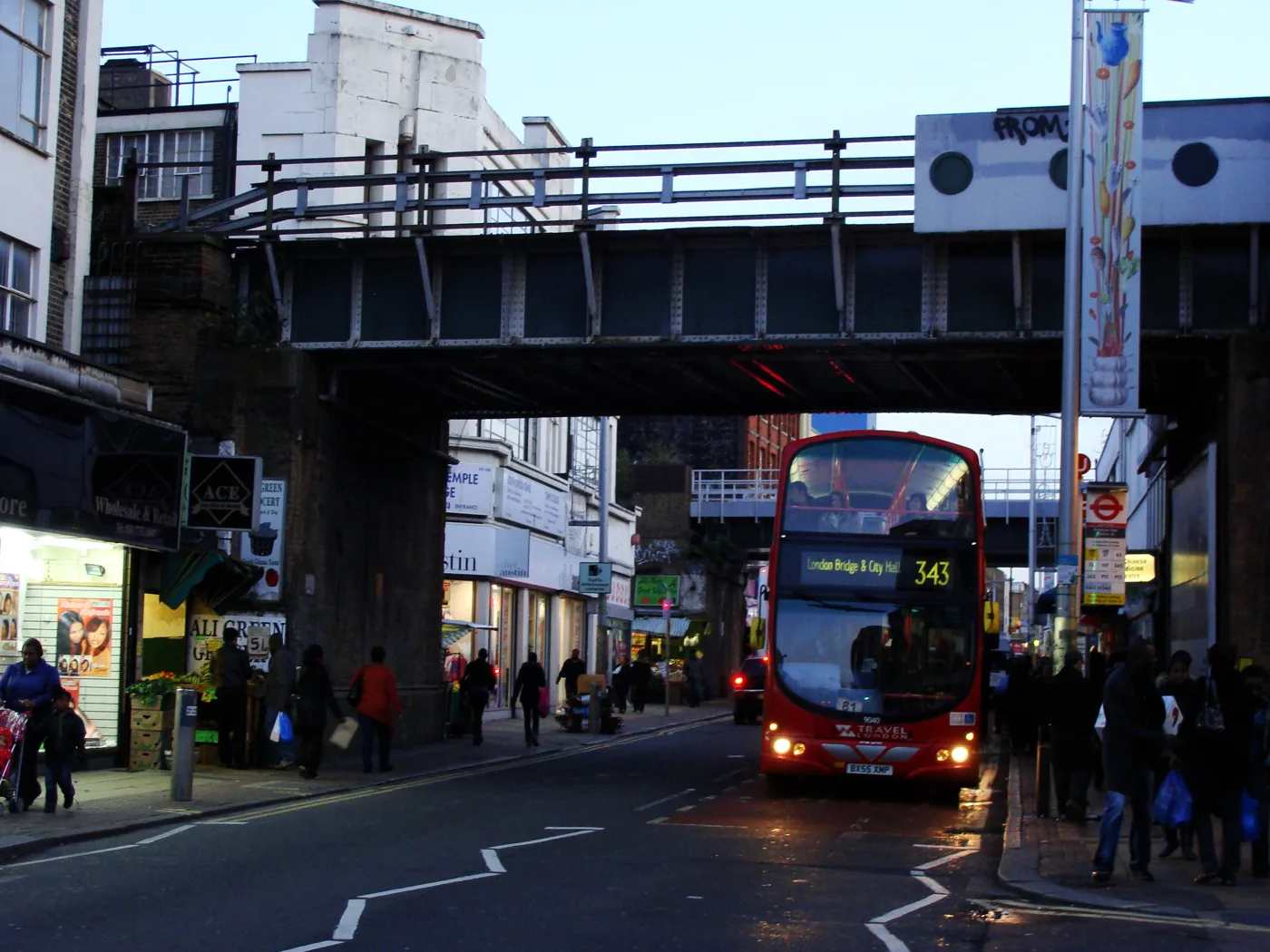 A route 343 bus under the railway bridge in Peckham